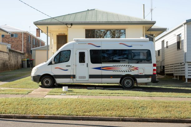 White motorhome parked outside an Australian home, ready for a replacement key
